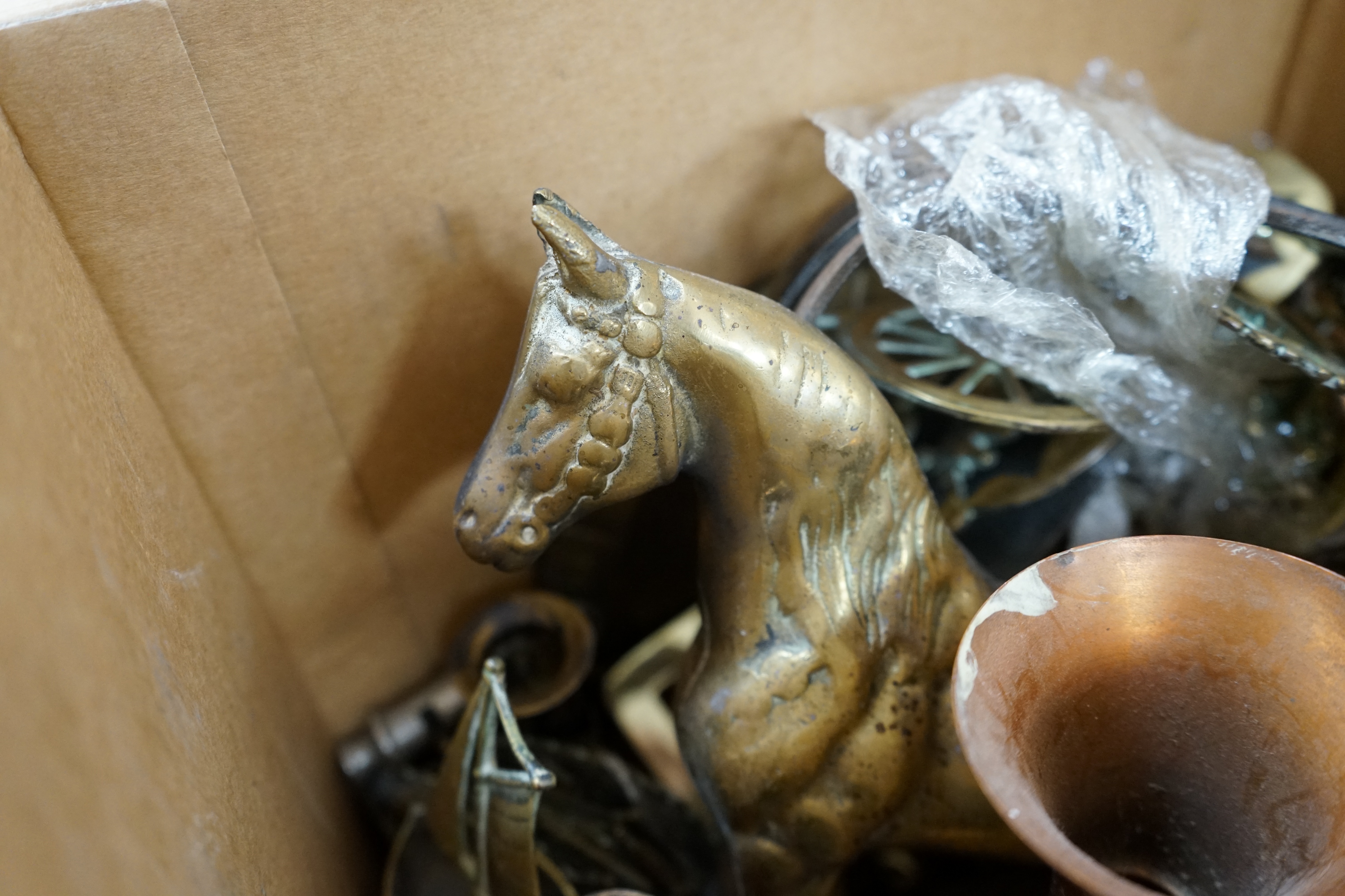 A quantity of Victorian and later copper and metalware to include horse brasses and a bugle. Condition - varies